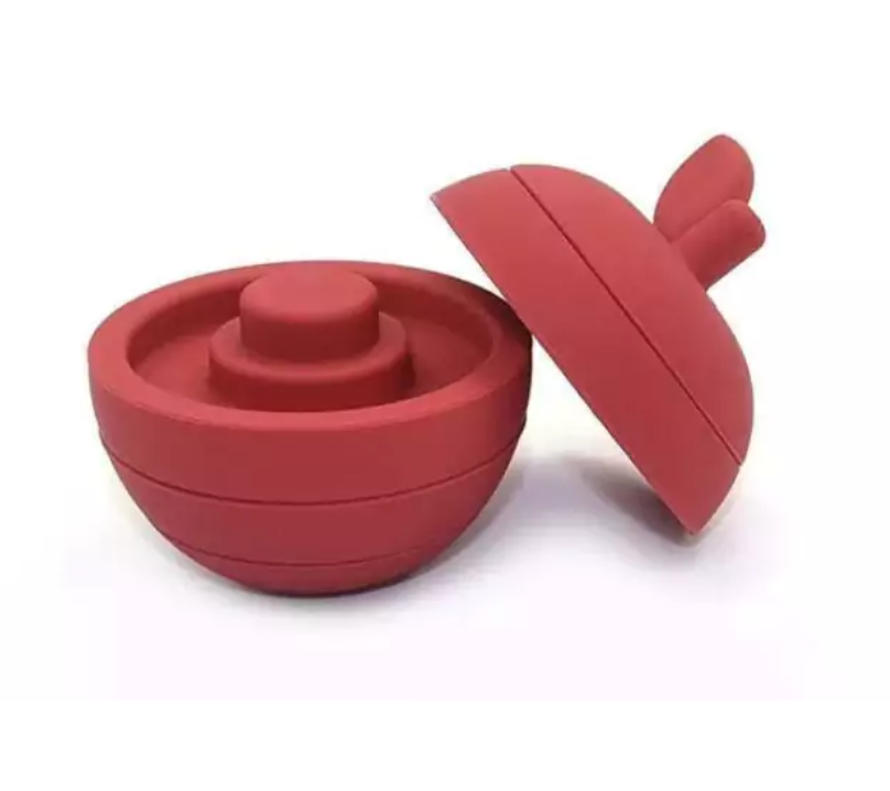 Maçã de silicone vermelho. Peças de encaixe