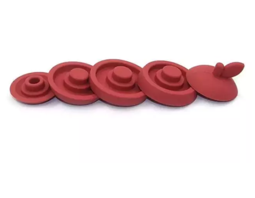 Maçã de silicone vermelho. Peças de encaixe