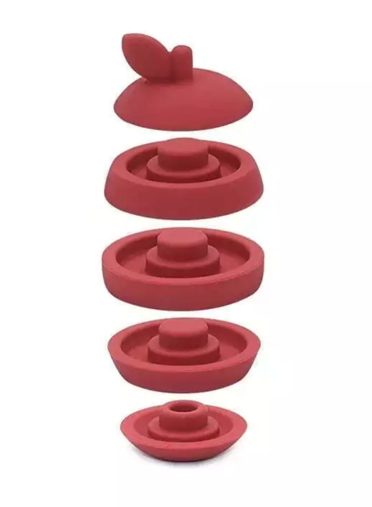 Maçã de silicone vermelho. Peças de encaixe